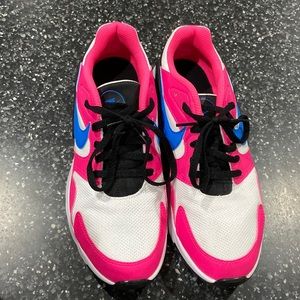 Pair of nike tennis shoes, worn once, pink/blue.